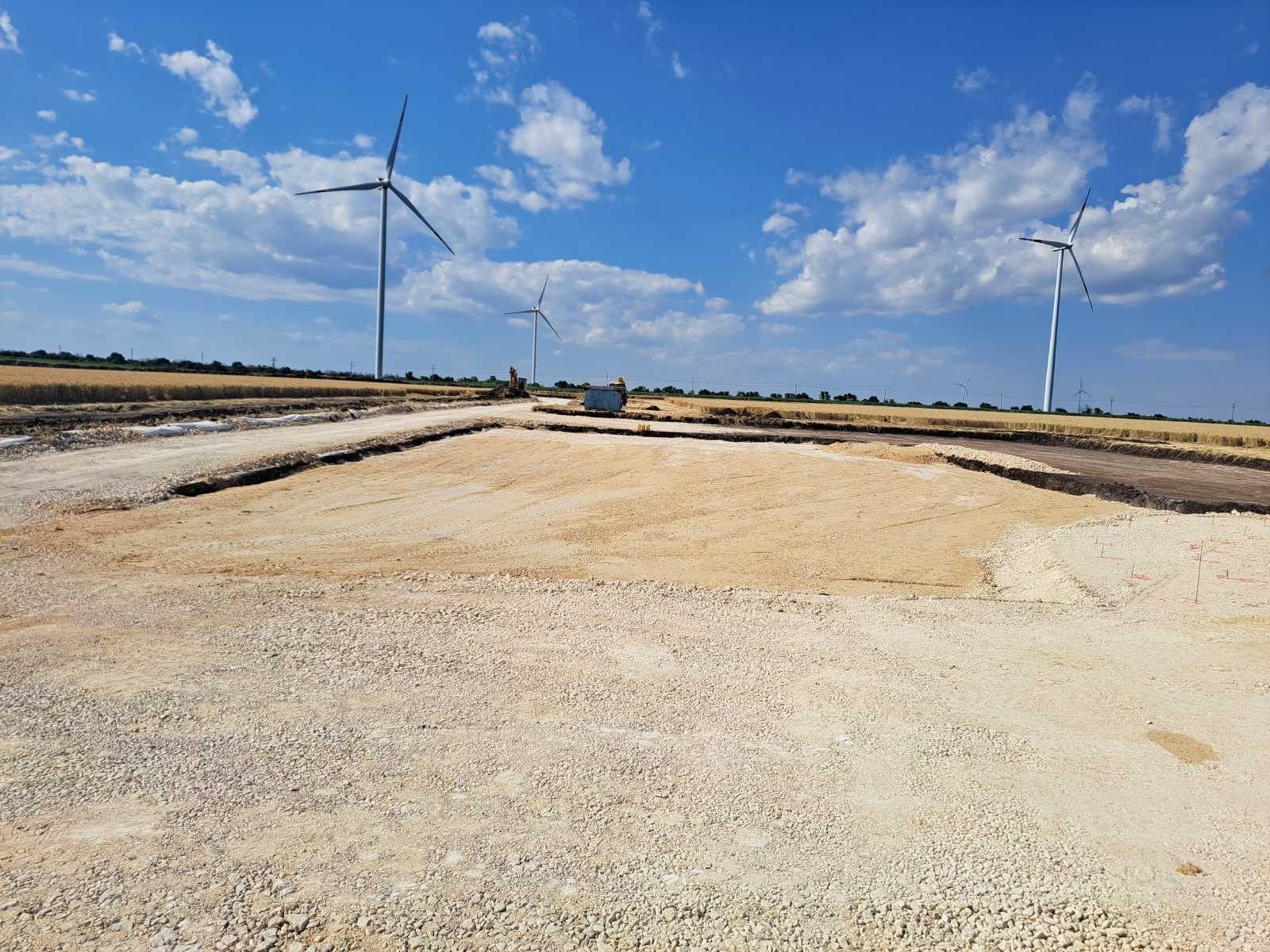 Wind turbines along a newly built site road in north-eastern Bulgaria