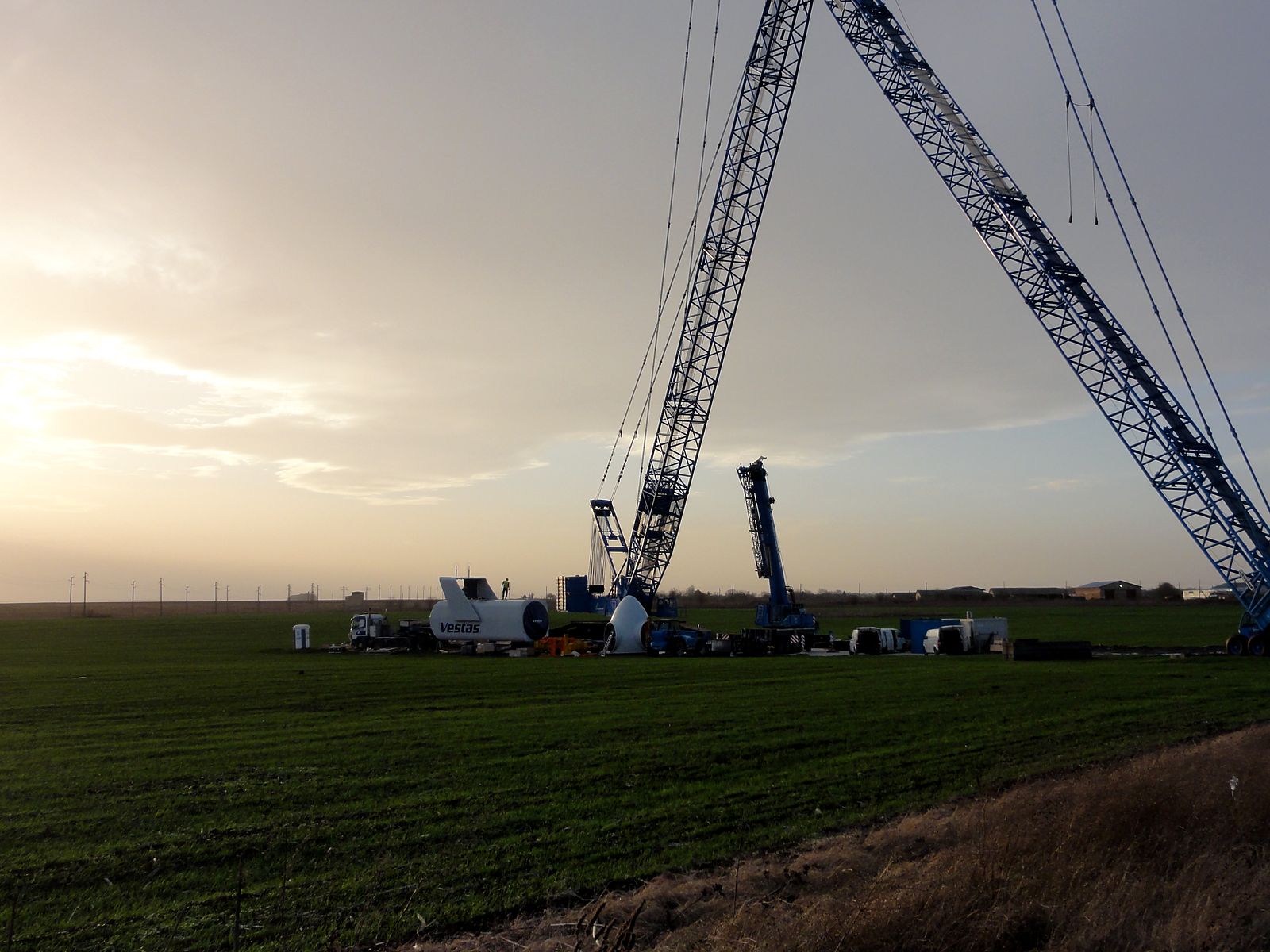 Crawler crane rising against the evening light at Balchik Wind I