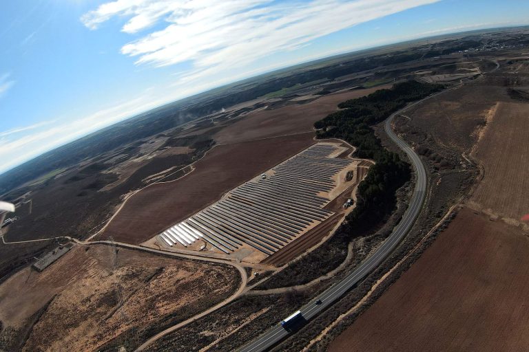 Drone view of the Candasnos solar plant in Aragon under a wide sky